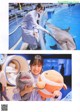 A woman in a lab coat holding a stuffed animal and a dolphin.